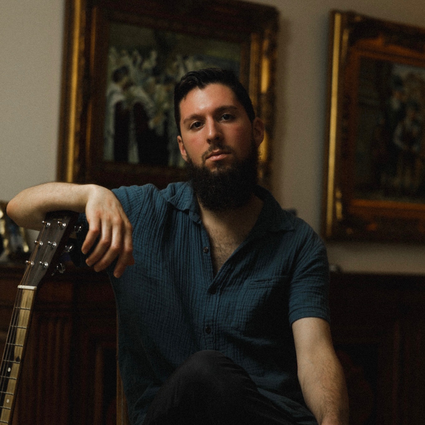 Duvy Burston with his guitar